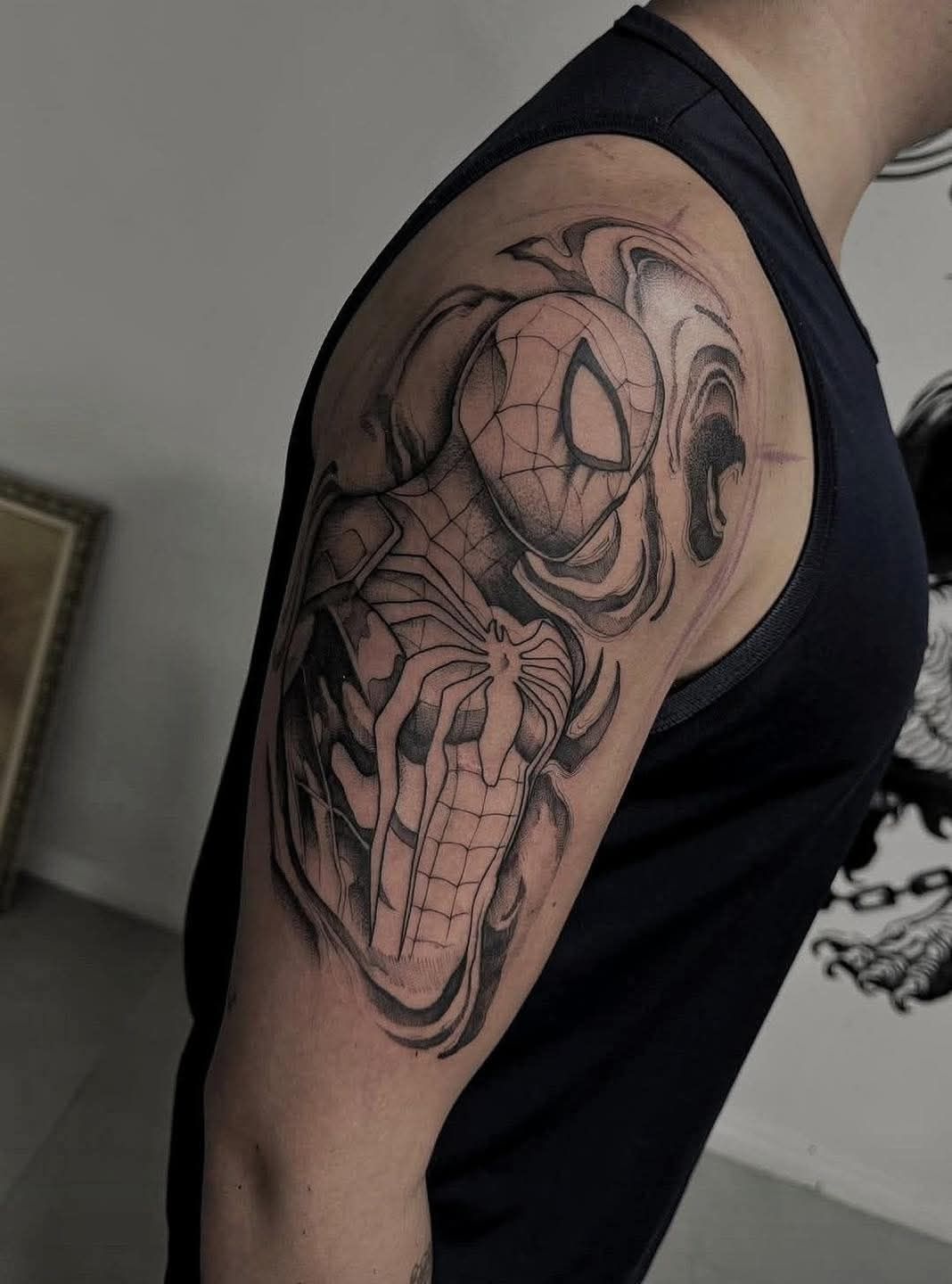 29 Spiderman Tattoo Ideas: From Minimalist Spider Symbols to Dramatic Symbiote Designs