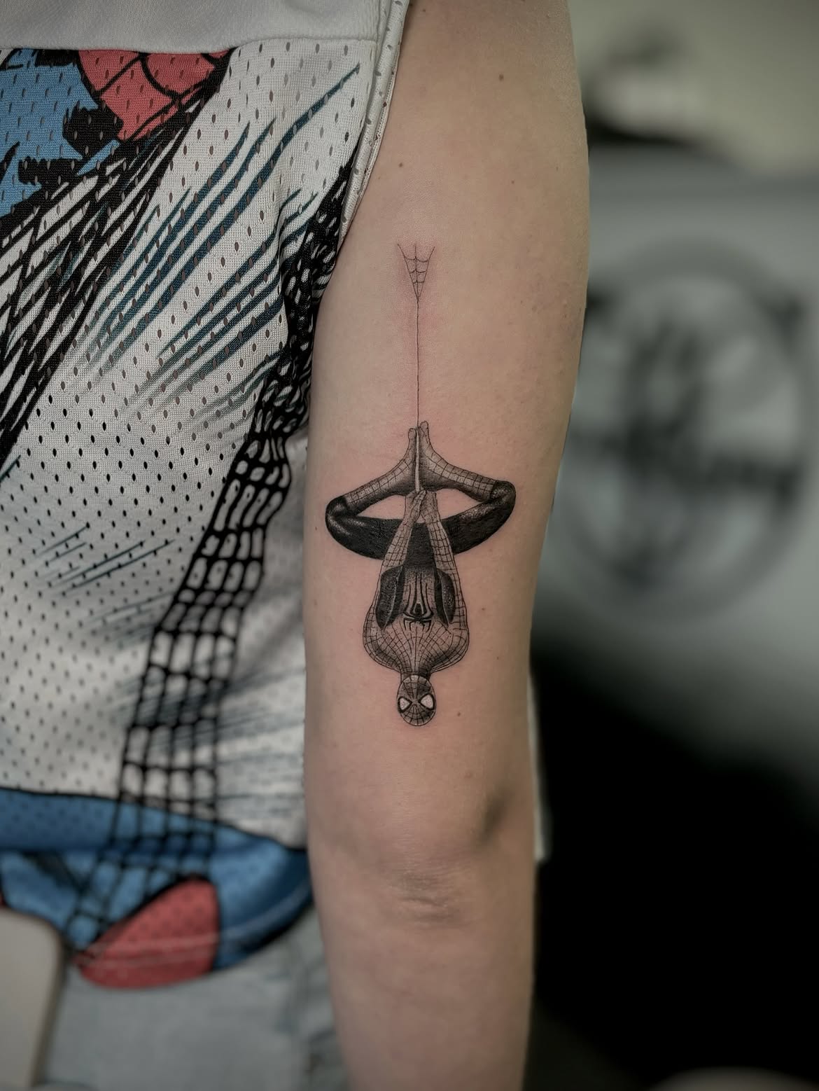 29 Spiderman Tattoo Ideas: From Minimalist Spider Symbols to Dramatic Symbiote Designs