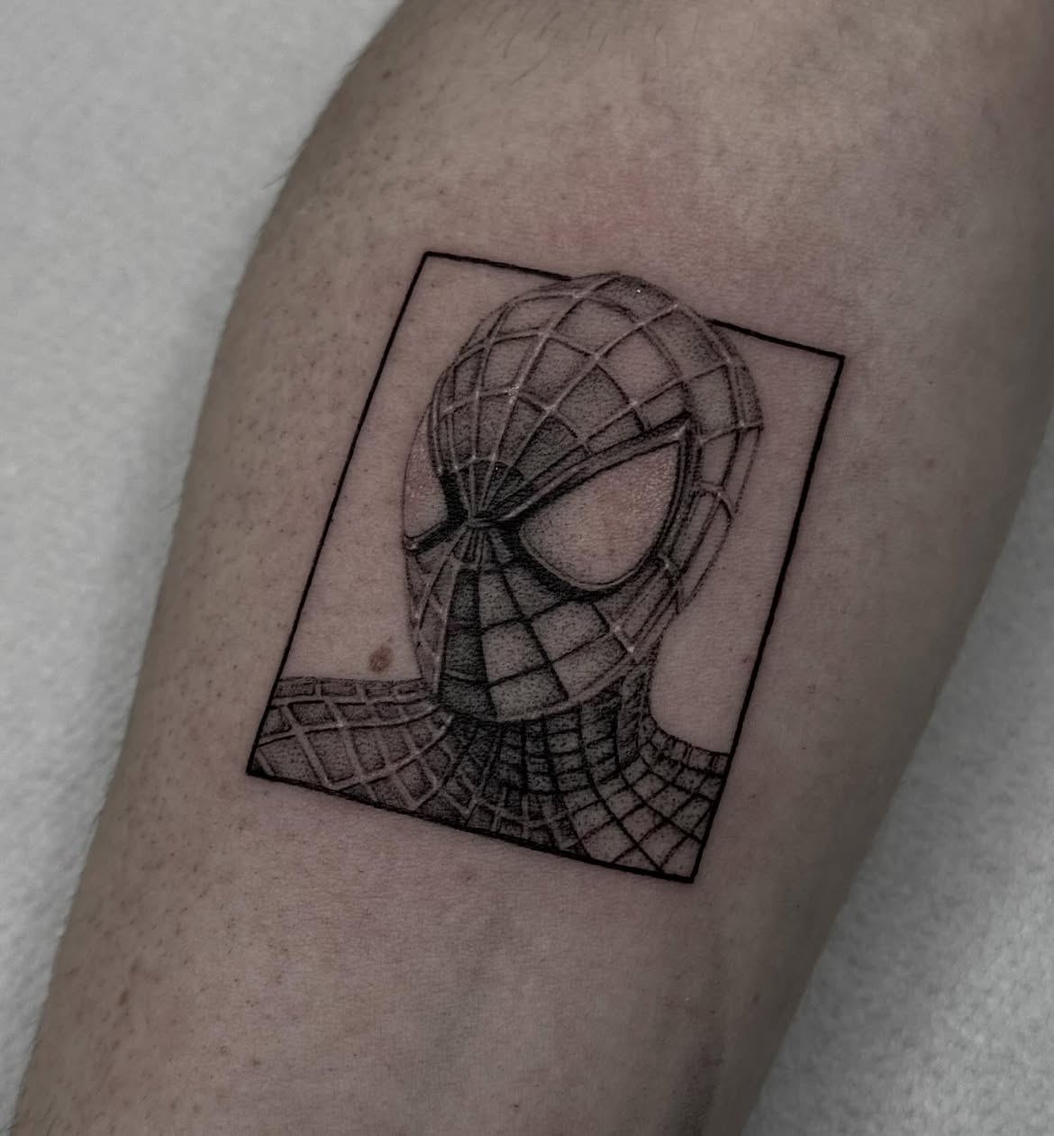 29 Spiderman Tattoo Ideas: From Minimalist Spider Symbols to Dramatic Symbiote Designs