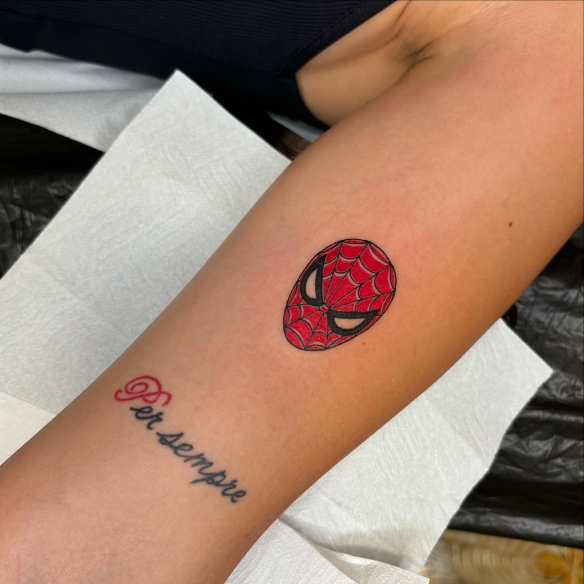 29 Spiderman Tattoo Ideas: From Minimalist Spider Symbols to Dramatic Symbiote Designs