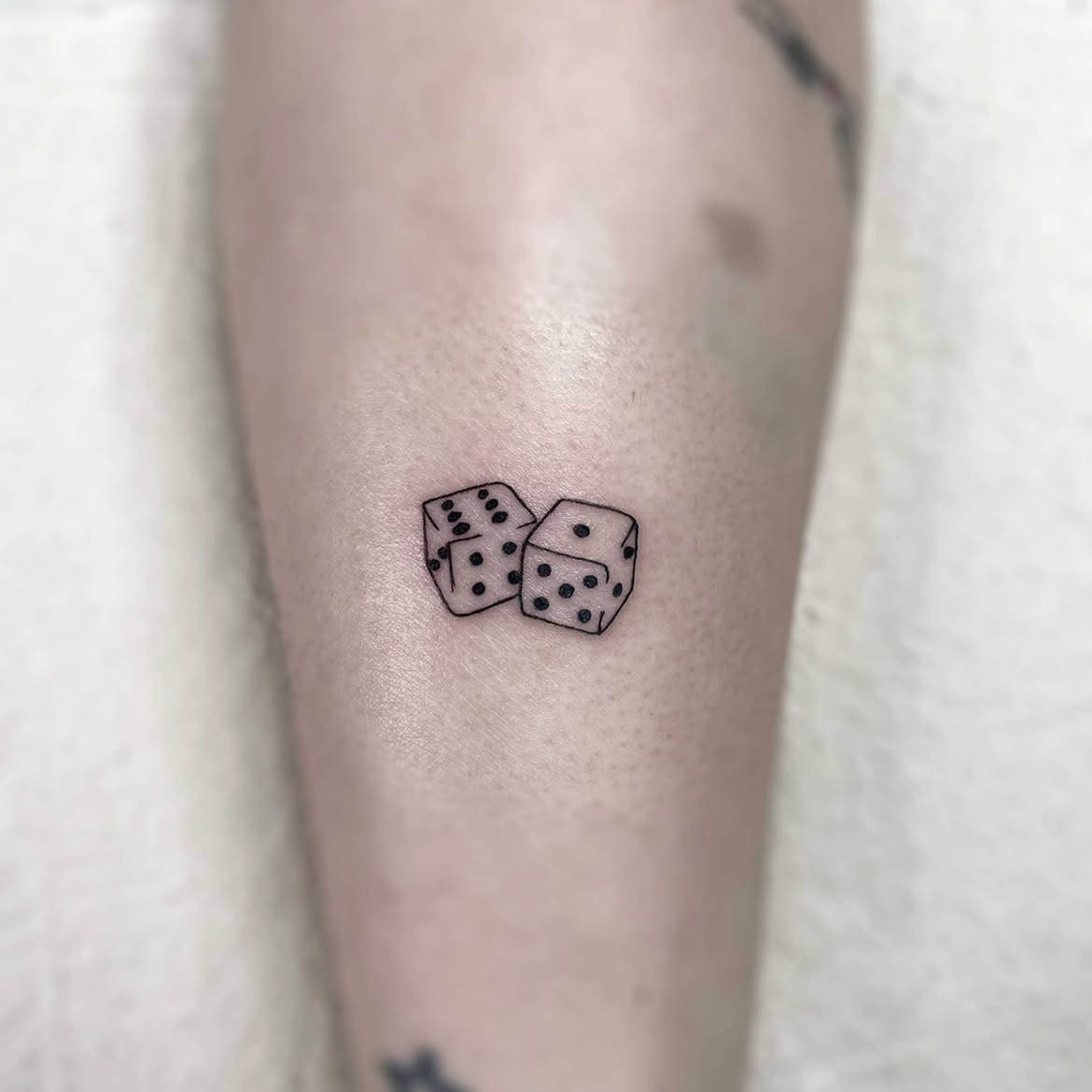 28 Dice Tattoo Ideas: From Lucky Rolls to Hearts, Flames, and Minimalist Designs