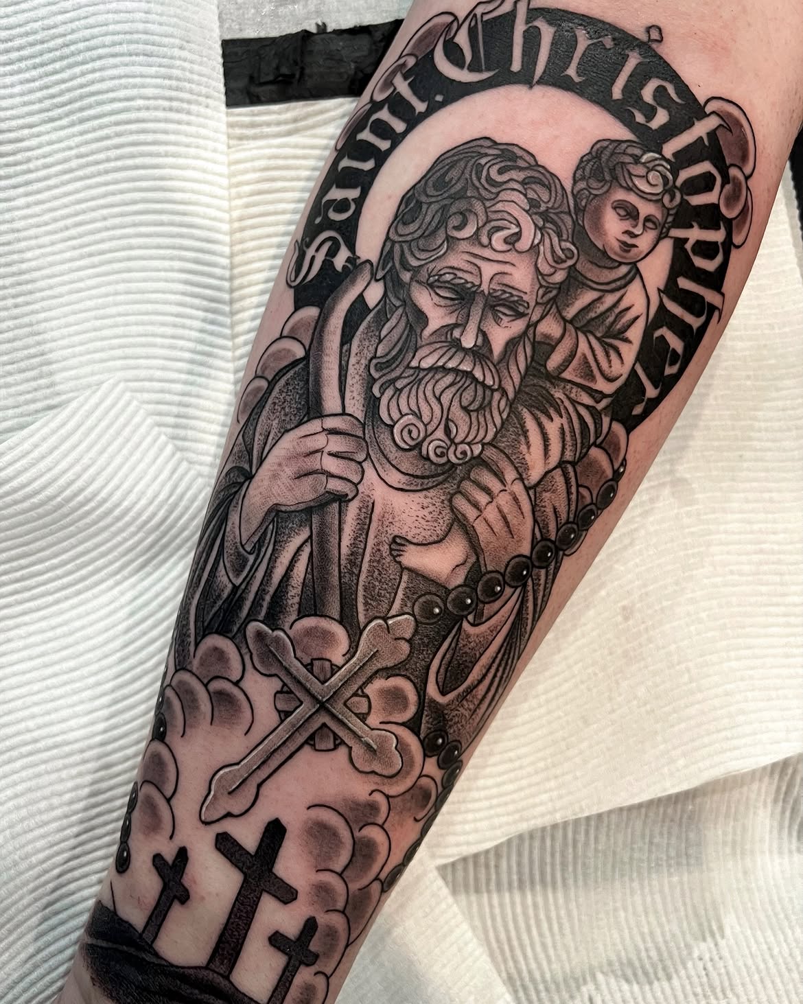 27 Saint Christopher Tattoo Ideas: From Fine Line Protection Symbols to Dramatic Religious Sleeves