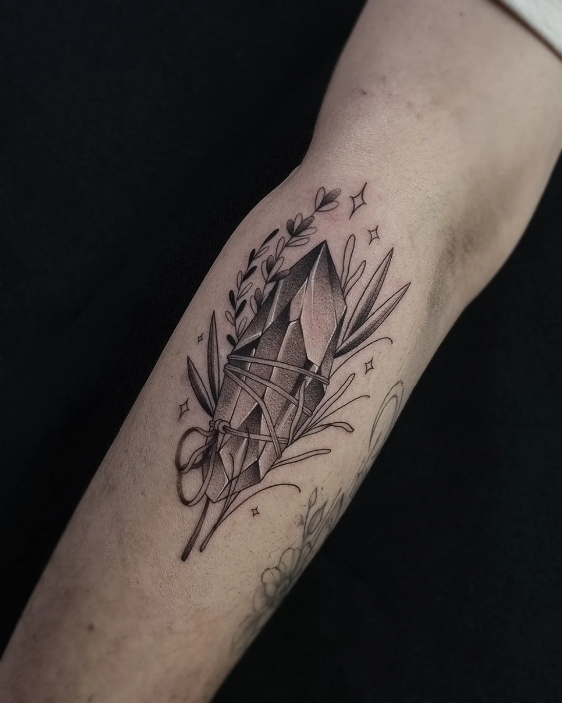 25 Crystal Tattoo Ideas: From Delicate Gemstones to Colorful Botanical Designs