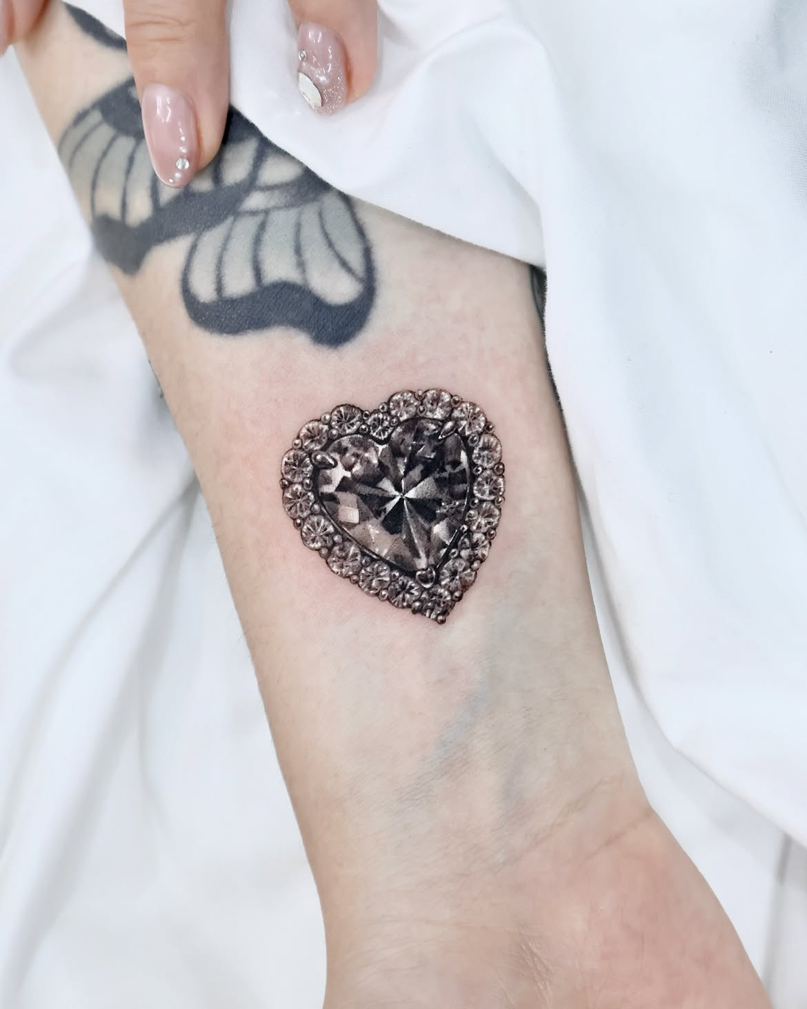 25 Crystal Tattoo Ideas: From Delicate Gemstones to Colorful Botanical Designs