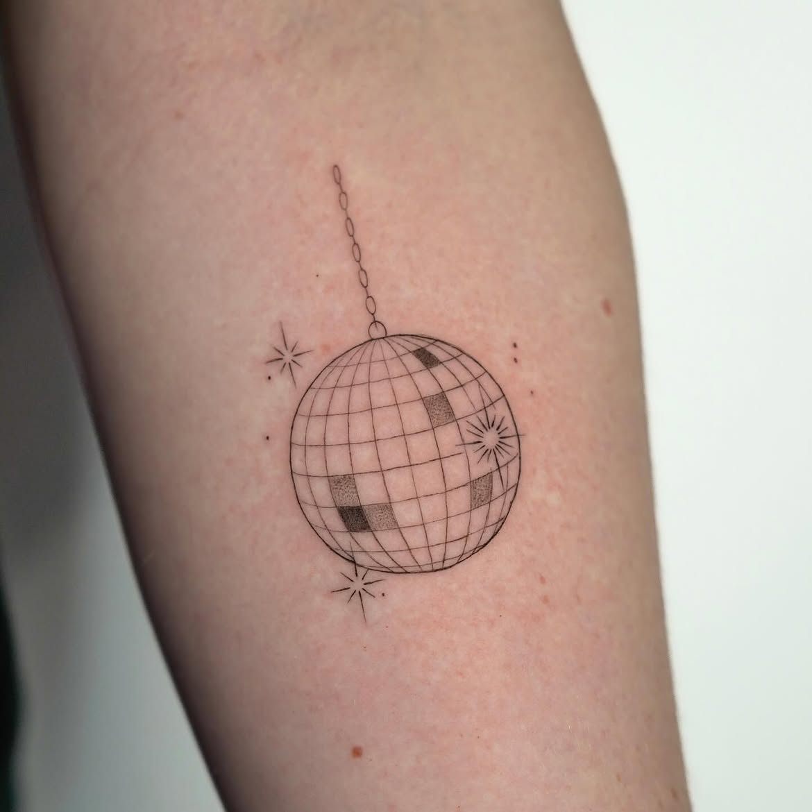 30 Disco Ball Tattoo Ideas: Creative Designs That Bring a Little Sparkle to Your Skin