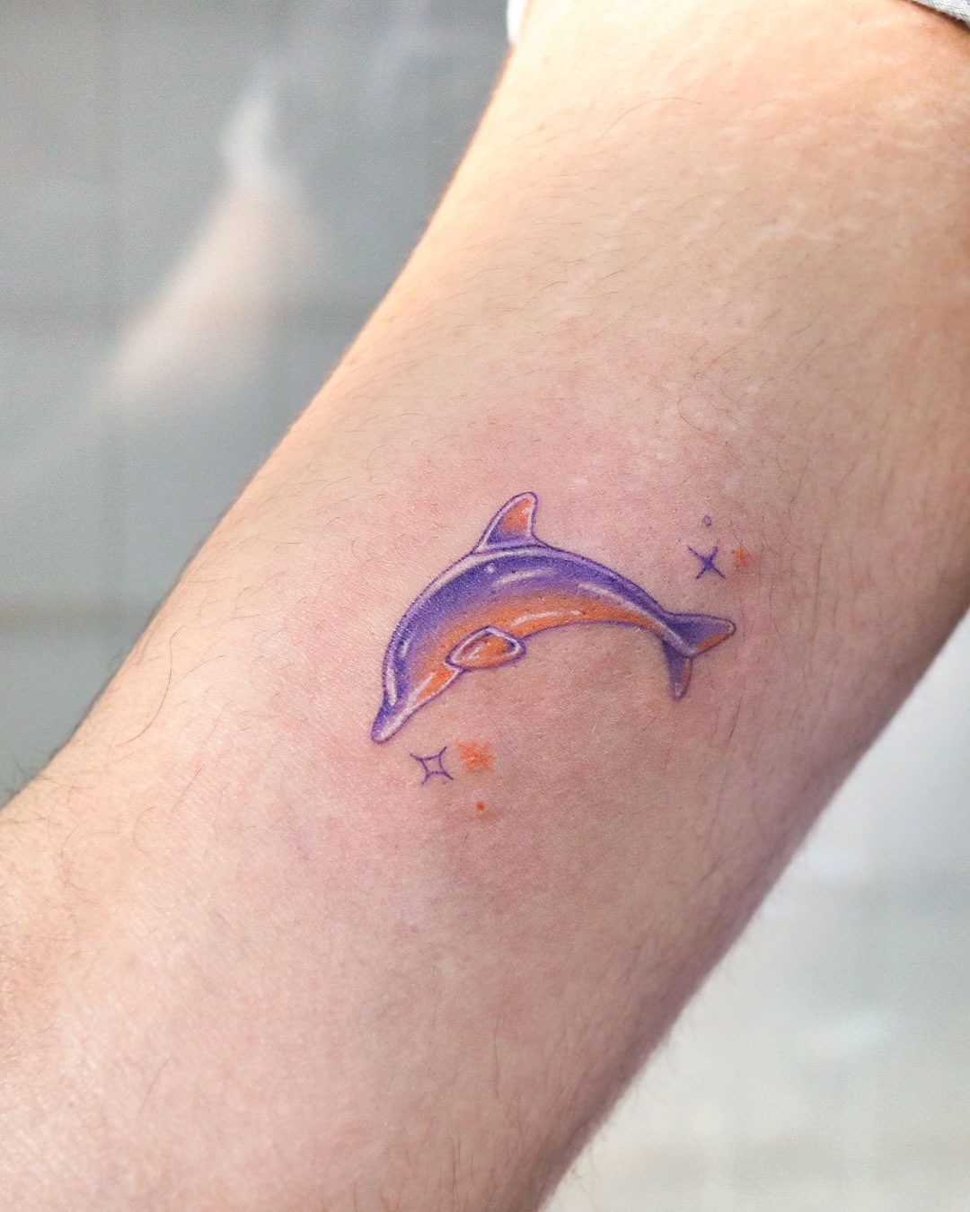 27 Dolphin Tattoo Ideas: Beautiful Designs That Capture Freedom, Joy, and Ocean Magic