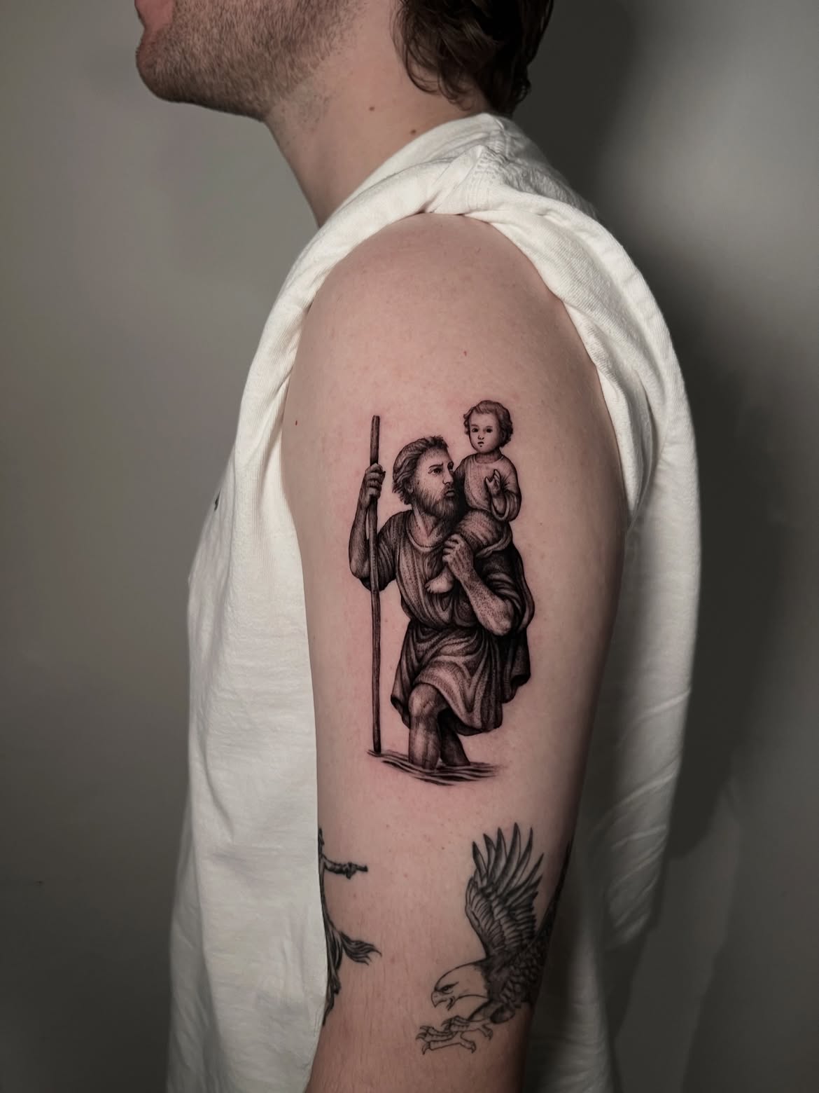 27 Saint Christopher Tattoo Ideas: From Fine Line Protection Symbols to Dramatic Religious Sleeves
