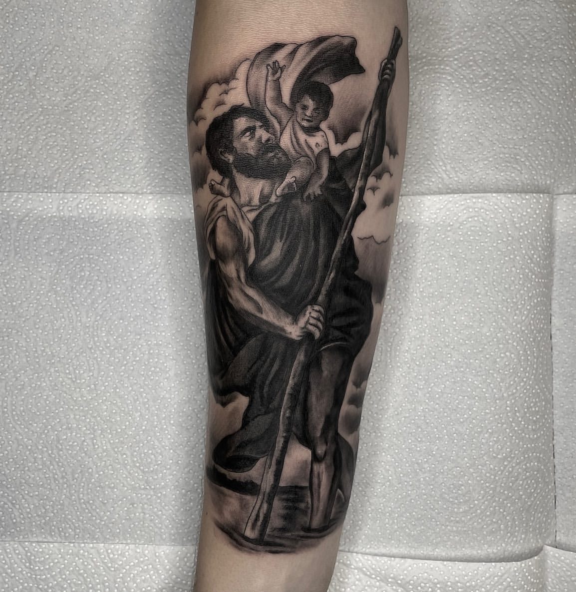 27 Saint Christopher Tattoo Ideas: From Fine Line Protection Symbols to Dramatic Religious Sleeves