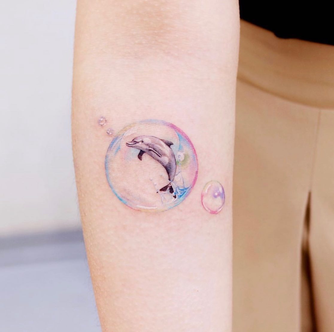 27 Dolphin Tattoo Ideas: Beautiful Designs That Capture Freedom, Joy, and Ocean Magic