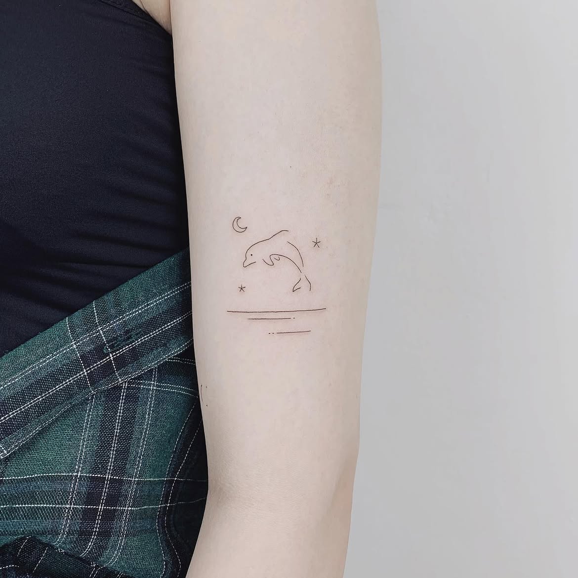 27 Dolphin Tattoo Ideas: Beautiful Designs That Capture Freedom, Joy, and Ocean Magic