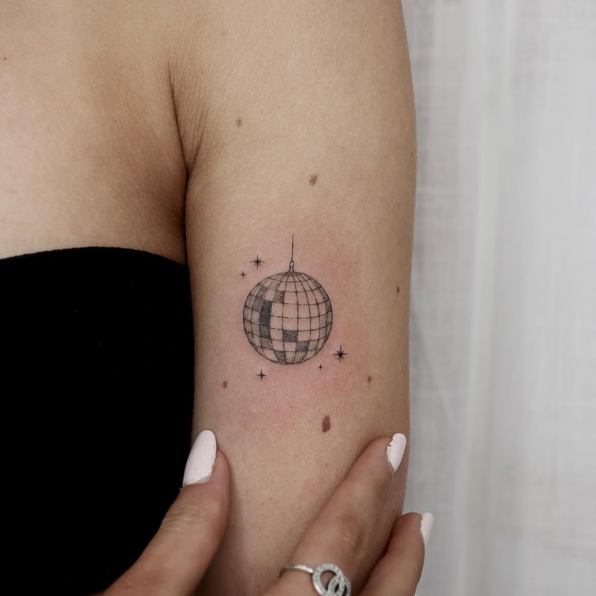 30 Disco Ball Tattoo Ideas: Creative Designs That Bring a Little Sparkle to Your Skin