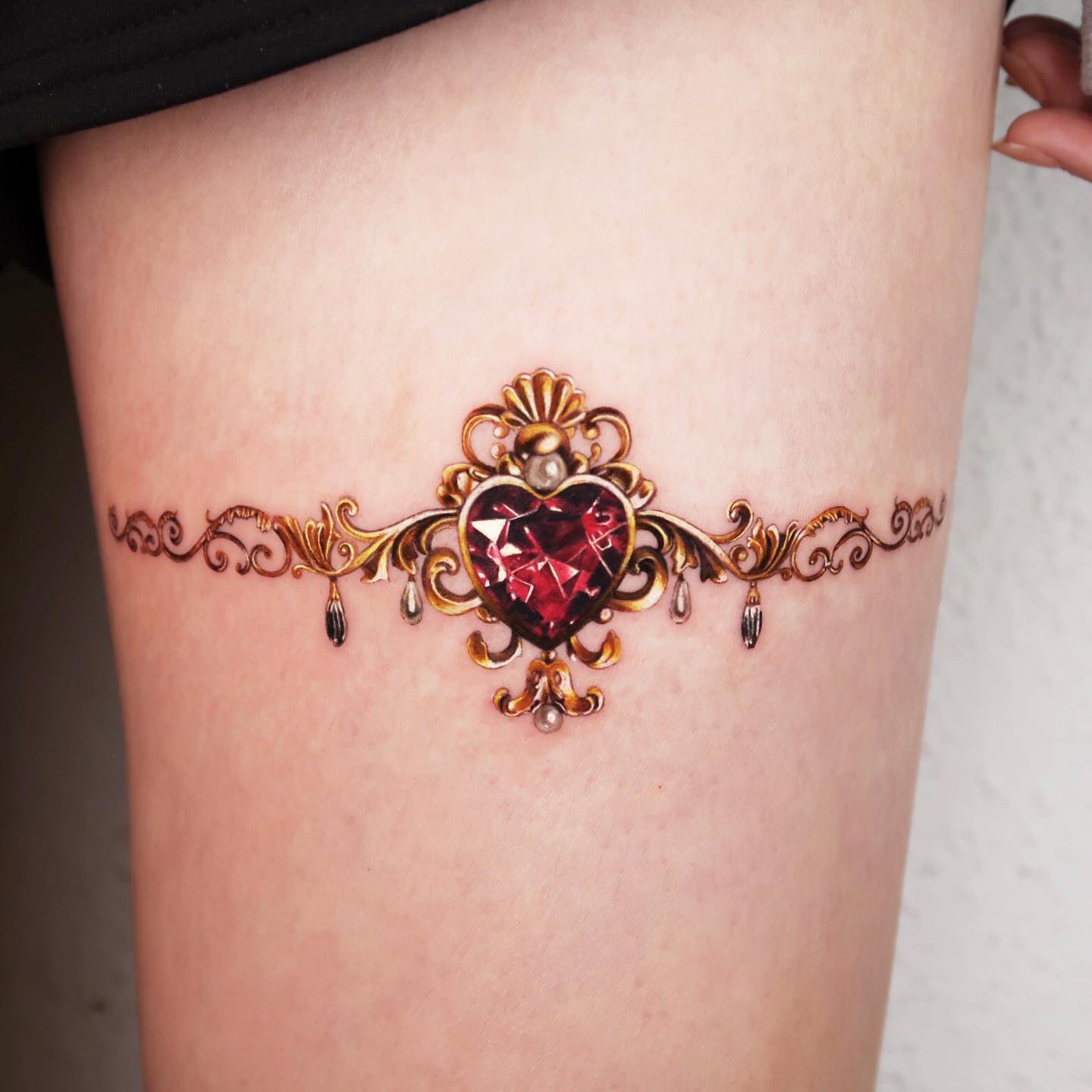 25 Crystal Tattoo Ideas: From Delicate Gemstones to Colorful Botanical Designs