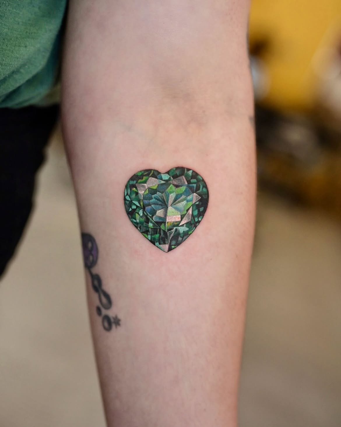 25 Crystal Tattoo Ideas: From Delicate Gemstones to Colorful Botanical Designs