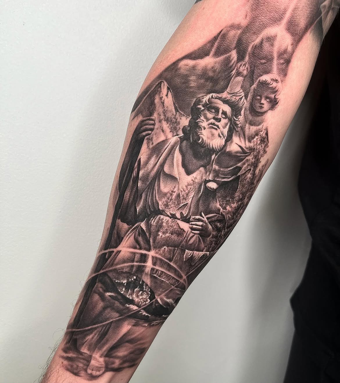 27 Saint Christopher Tattoo Ideas: From Fine Line Protection Symbols to Dramatic Religious Sleeves