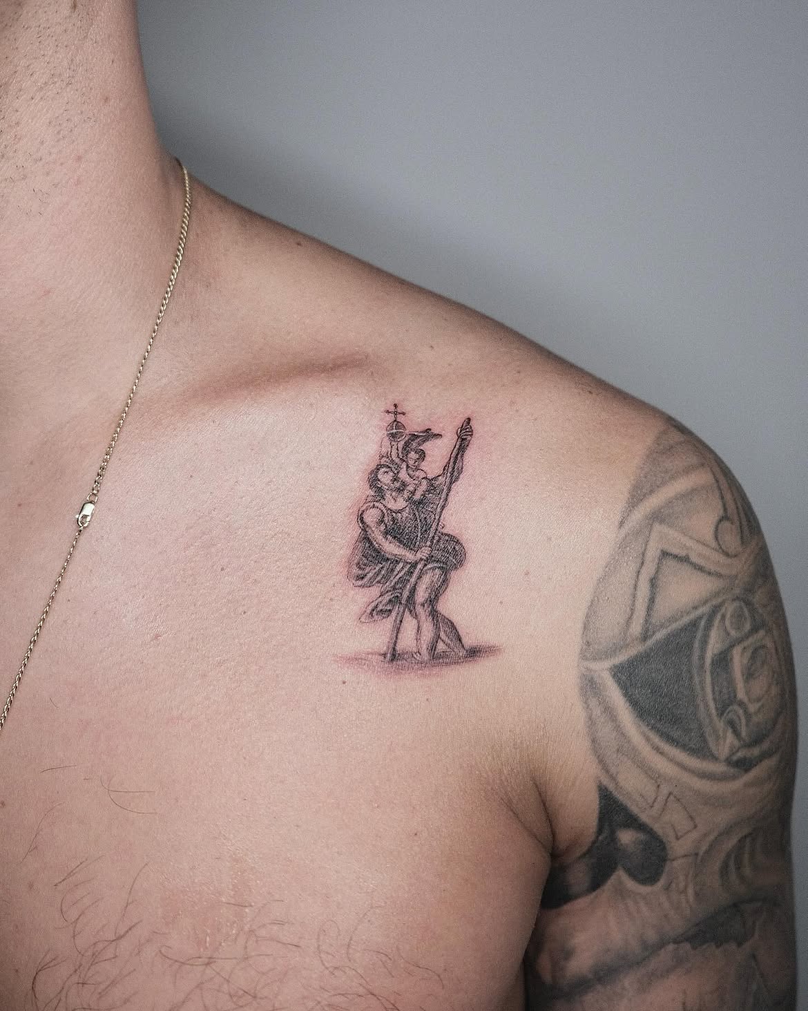 27 Saint Christopher Tattoo Ideas: From Fine Line Protection Symbols to Dramatic Religious Sleeves