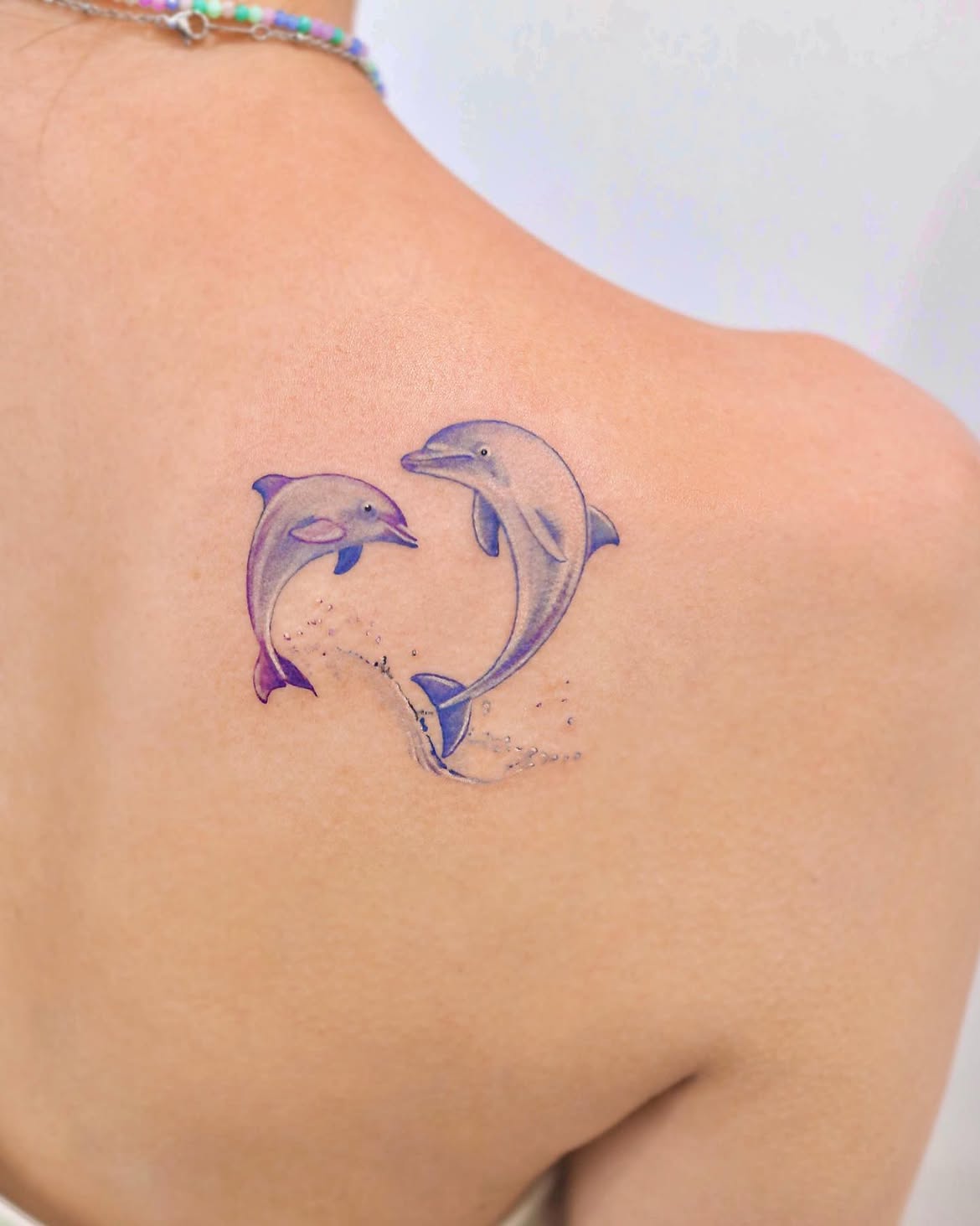 27 Dolphin Tattoo Ideas: Beautiful Designs That Capture Freedom, Joy, and Ocean Magic