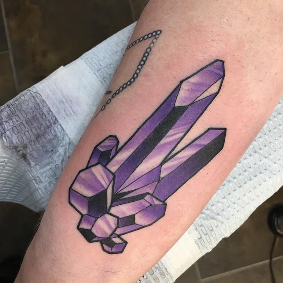 25 Crystal Tattoo Ideas: From Delicate Gemstones to Colorful Botanical Designs