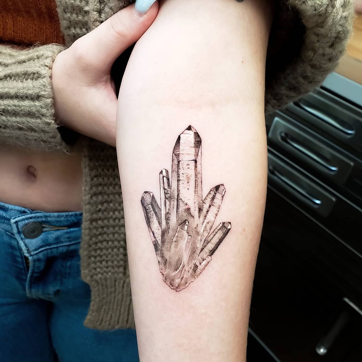 25 Crystal Tattoo Ideas: From Delicate Gemstones to Colorful Botanical Designs