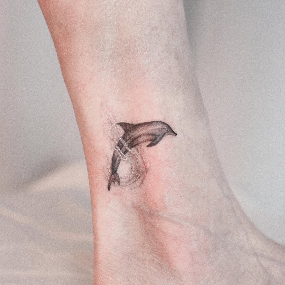 27 Dolphin Tattoo Ideas: Beautiful Designs That Capture Freedom, Joy, and Ocean Magic