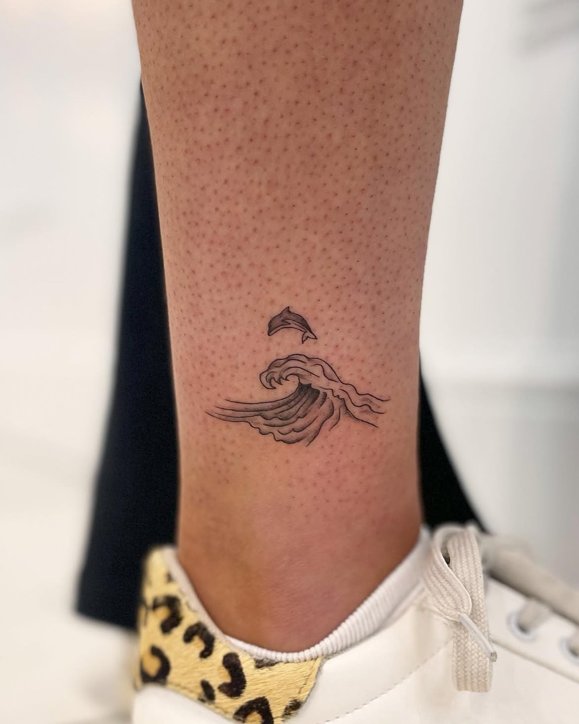 27 Dolphin Tattoo Ideas: Beautiful Designs That Capture Freedom, Joy, and Ocean Magic