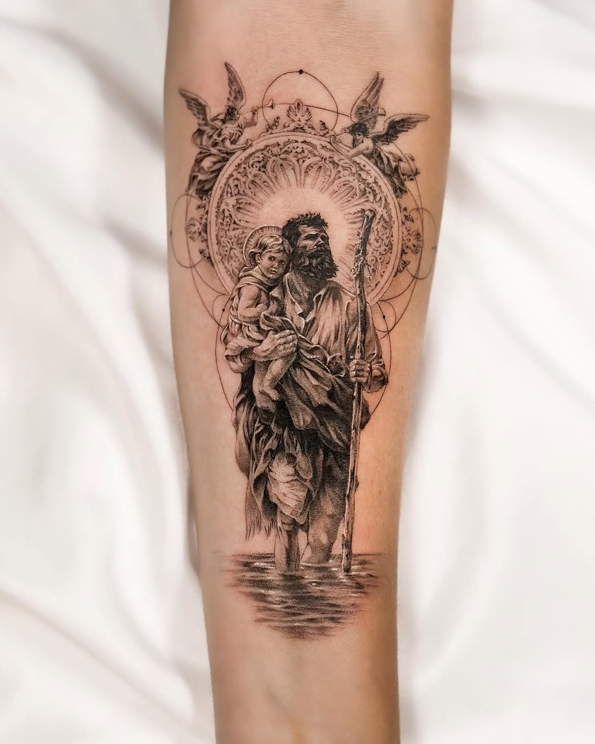 27 Saint Christopher Tattoo Ideas: From Fine Line Protection Symbols to Dramatic Religious Sleeves