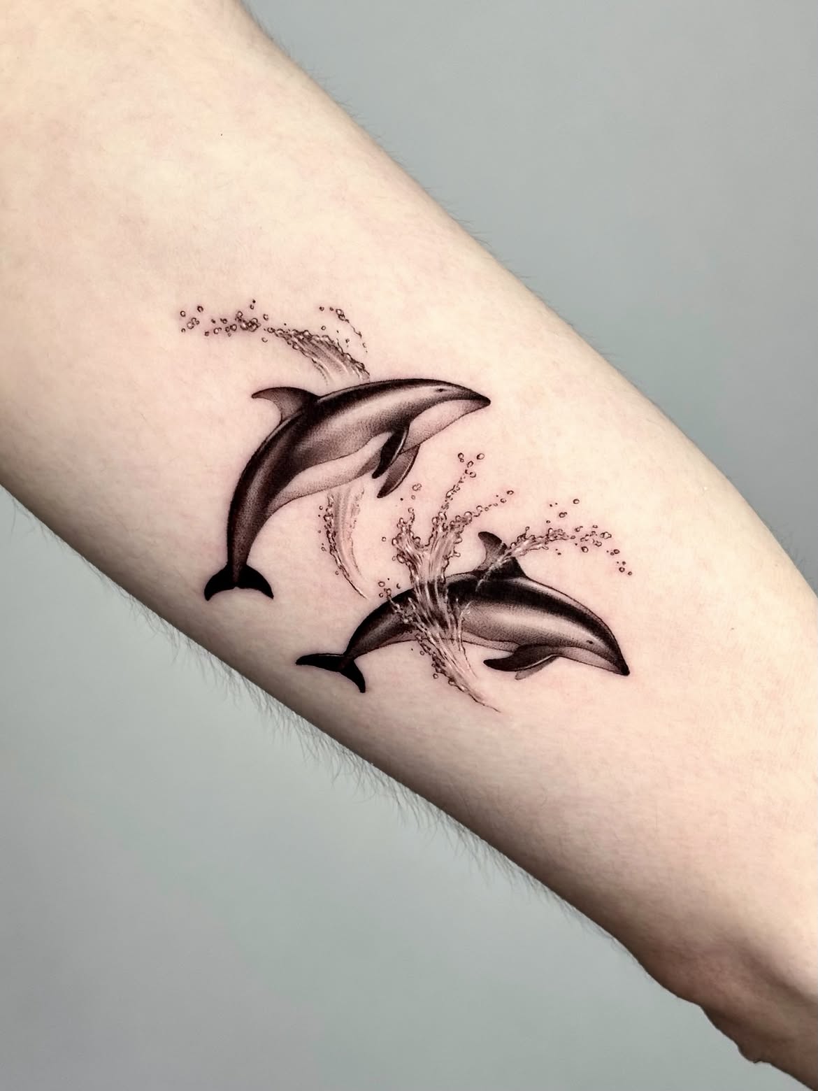 27 Dolphin Tattoo Ideas: Beautiful Designs That Capture Freedom, Joy, and Ocean Magic