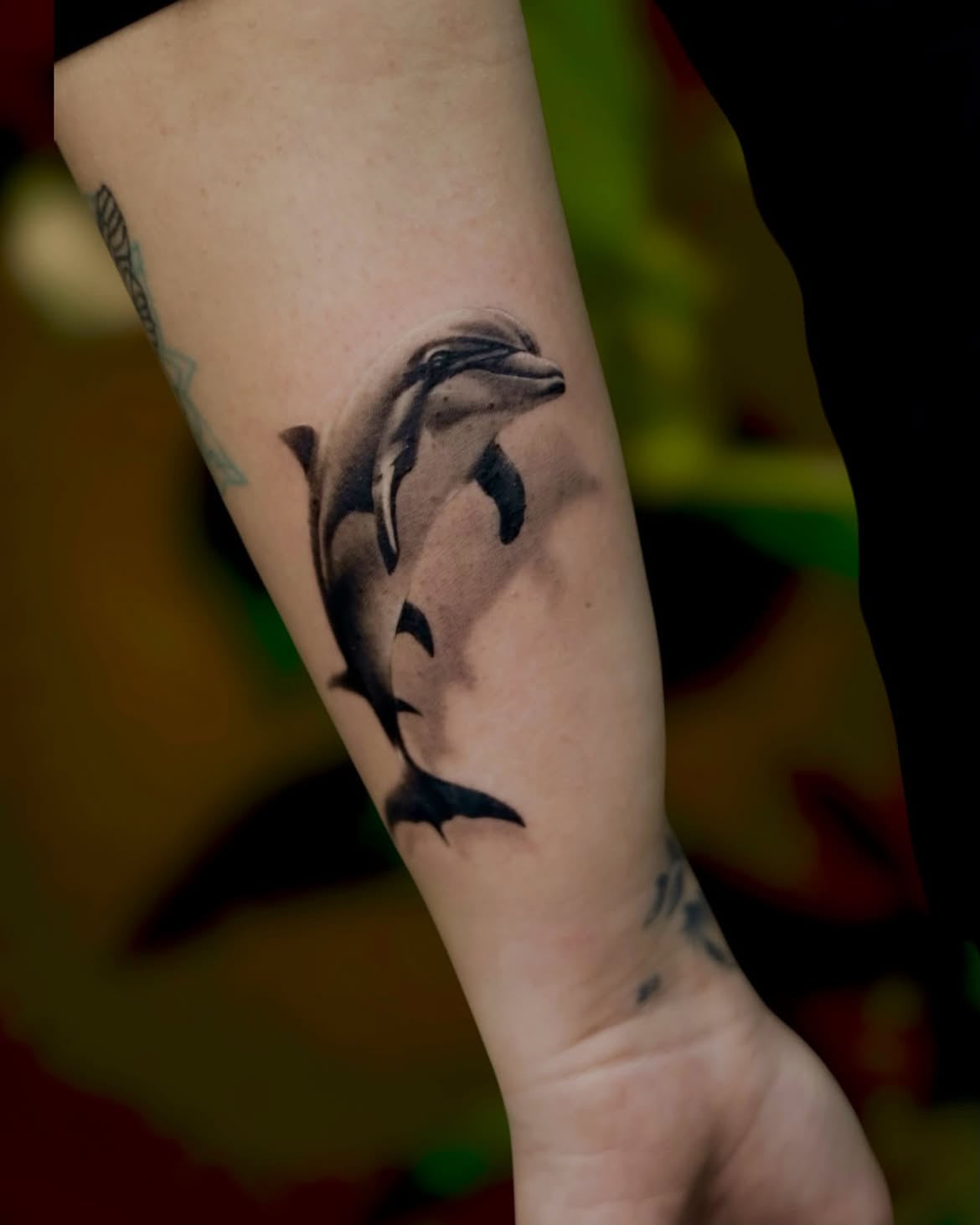 27 Dolphin Tattoo Ideas: Beautiful Designs That Capture Freedom, Joy, and Ocean Magic