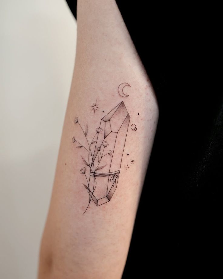 25 Crystal Tattoo Ideas: From Delicate Gemstones to Colorful Botanical Designs